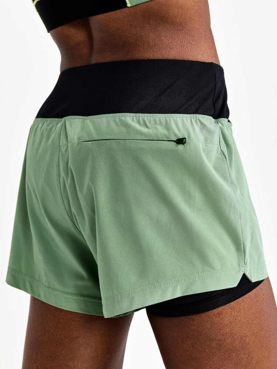 Craft ADV Essence 2v1 Shorts Green W - main (2)
